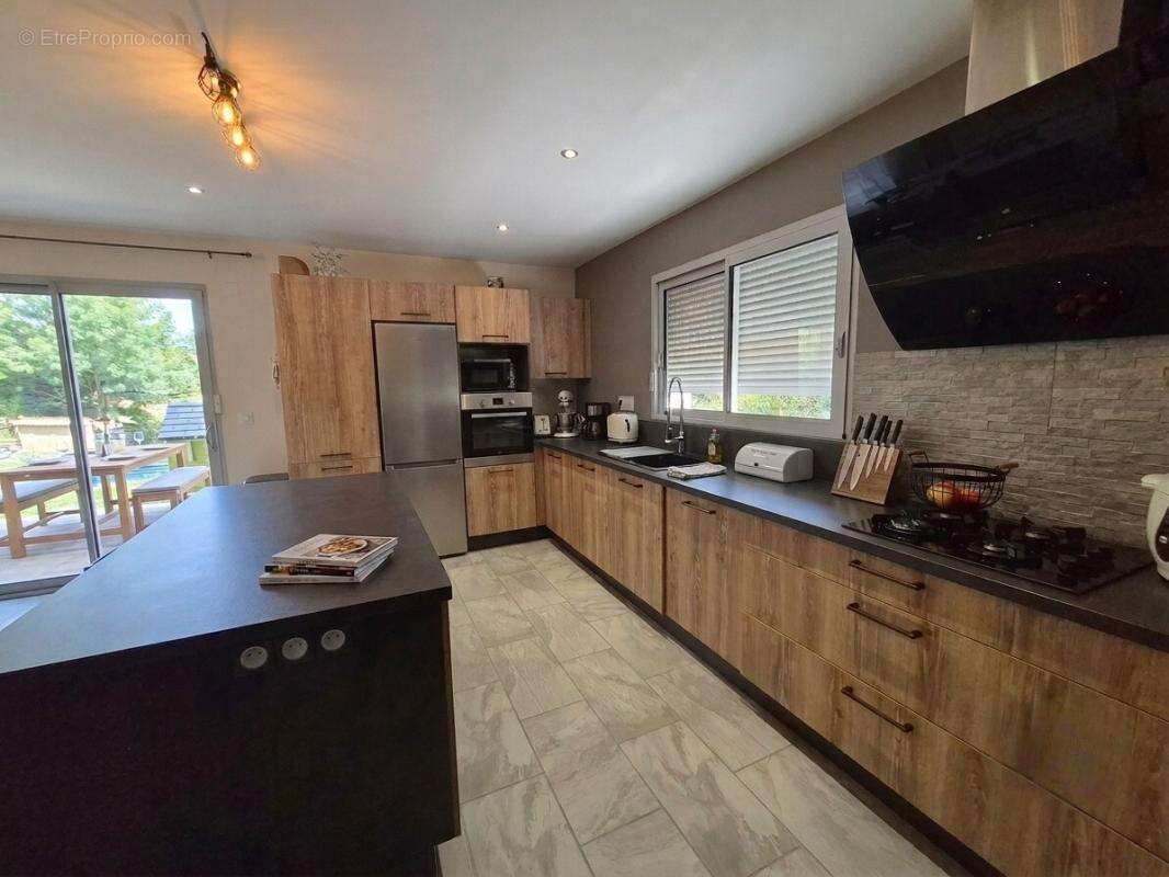 Maison Augerolles 5 pièces +/- 100 m2 avec jardin 1500m2 environ - photo 6