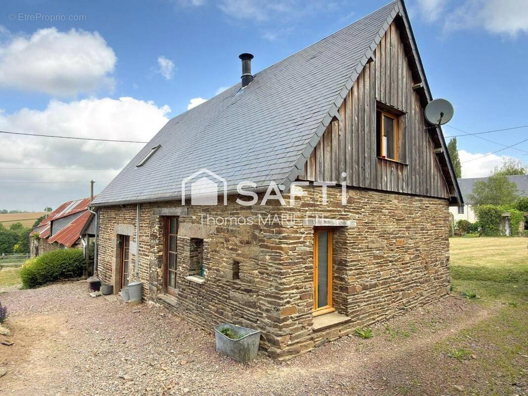 Photo 1 - Maison à SOURDEVAL