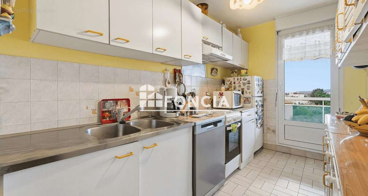 Appartement T2 de 50m2 - parking privatif - cave - photo 5