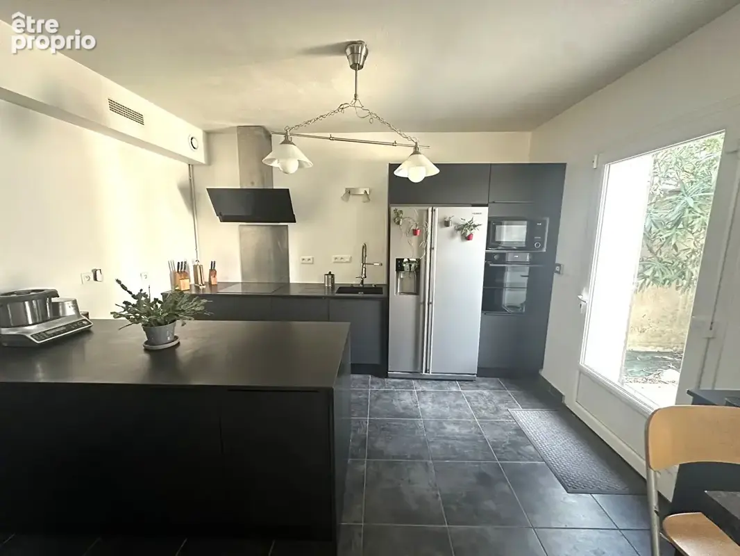 Maison 5 pièces de 130m² - photo 9