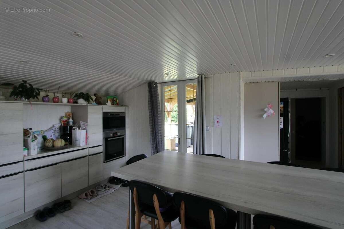 Maison 186 m² à Mesnil-Rousset  - photo 3