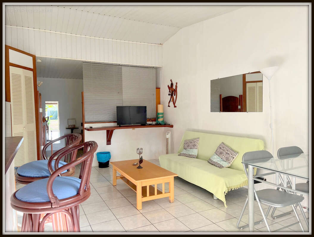 A vendre a kourou (97310) une magnifique maison en bois t5 de 106 m² avec 2 maisons t2 independantes - terrain de 775 m² - au pr - photo 13
