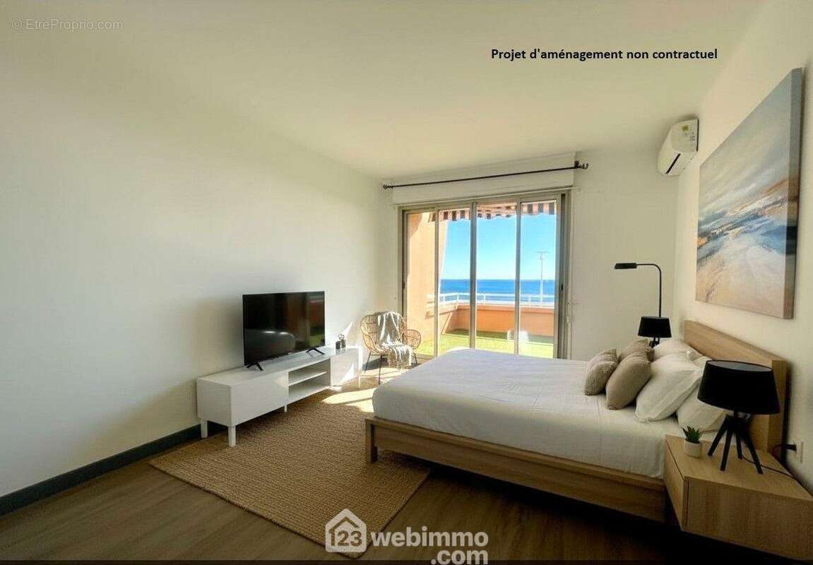 La chambre principale s?ouvre directement sur la terrasse, prolongeant l?espace vers l?extérieur et la vue mer. - Appartement à SAINTE-MAXIME