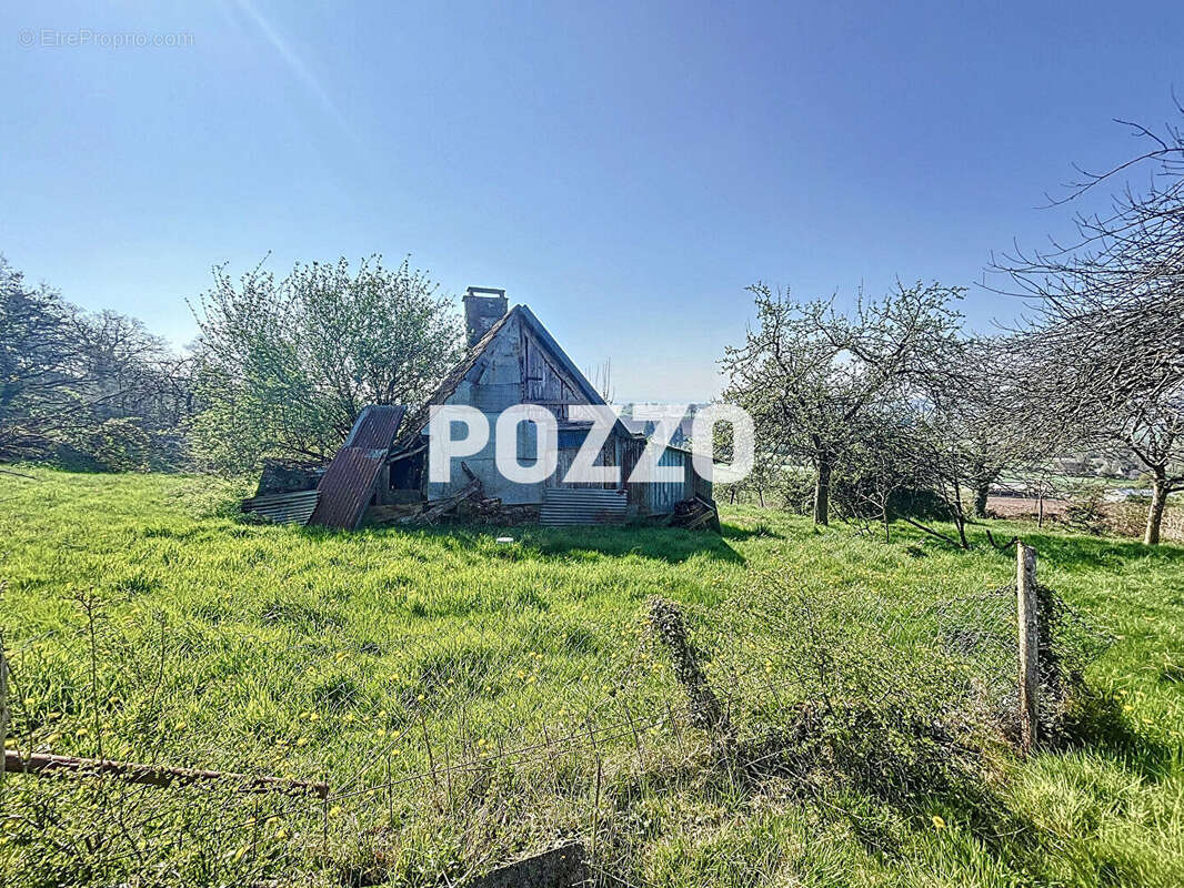 Maison à JUVIGNY-LE-TERTRE