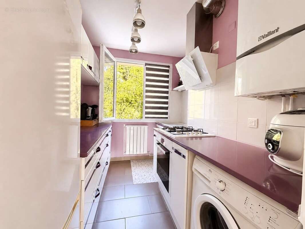 Appartement F3 de 65 m² avec cave et parking privatif - photo 4