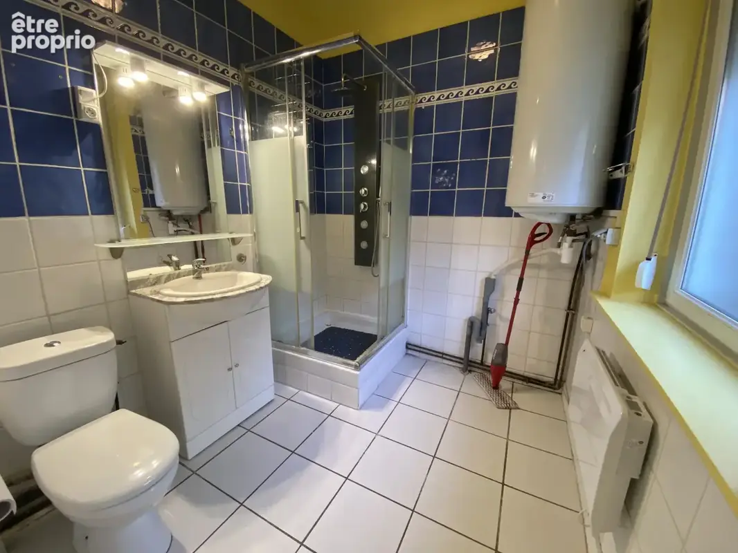 Duplex en plein centre de ville de Loos - photo 3