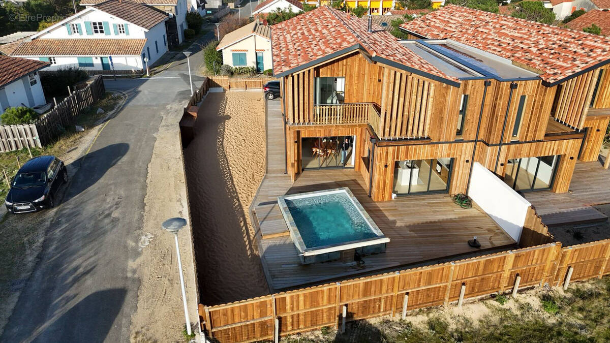 Photo 1 - Maison à SAINT-JULIEN-EN-BORN