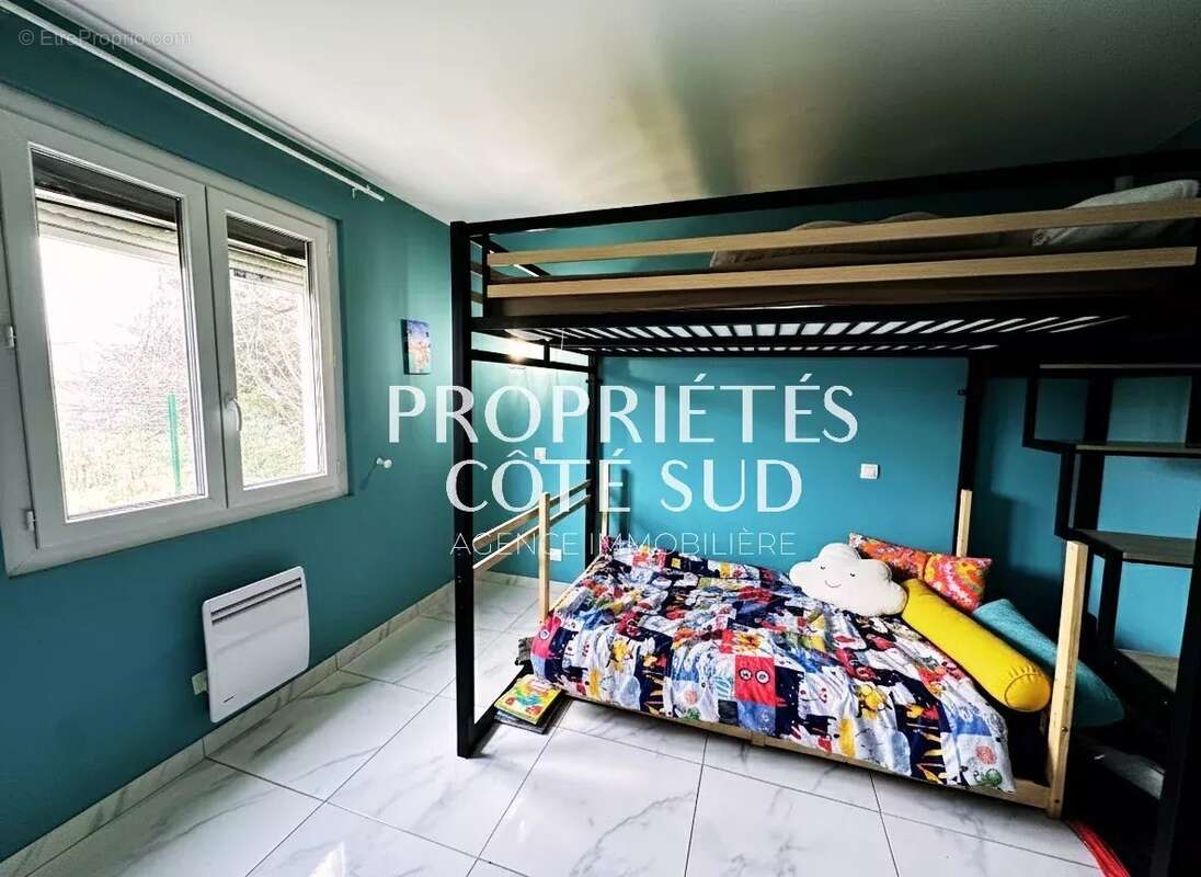 Maison à LAUDUN-L'ARDOISE