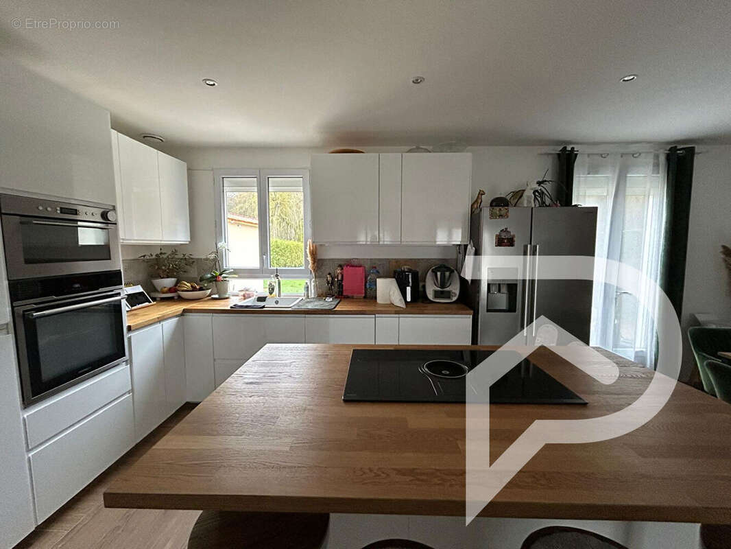 Maison à MOGNEVILLE