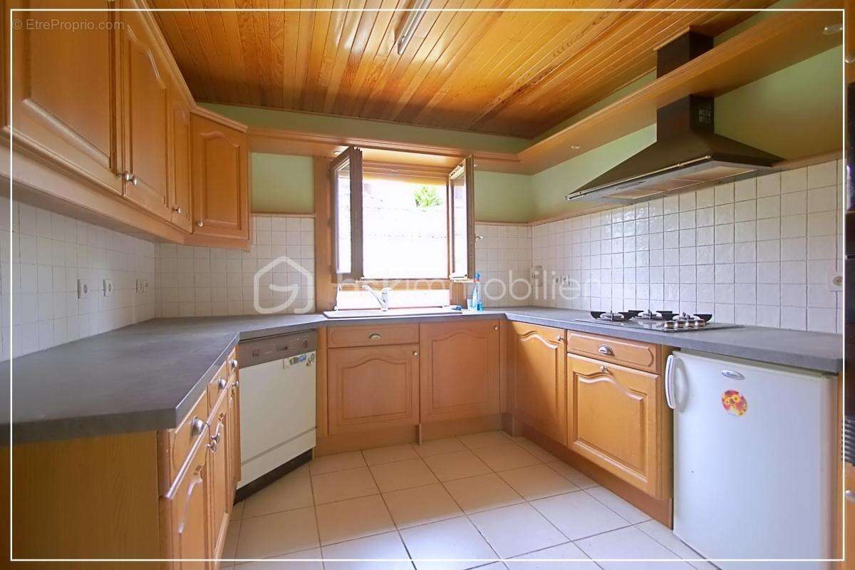 Maison de plain-pied avec garage sur terrain clos de 770 m² - photo 11