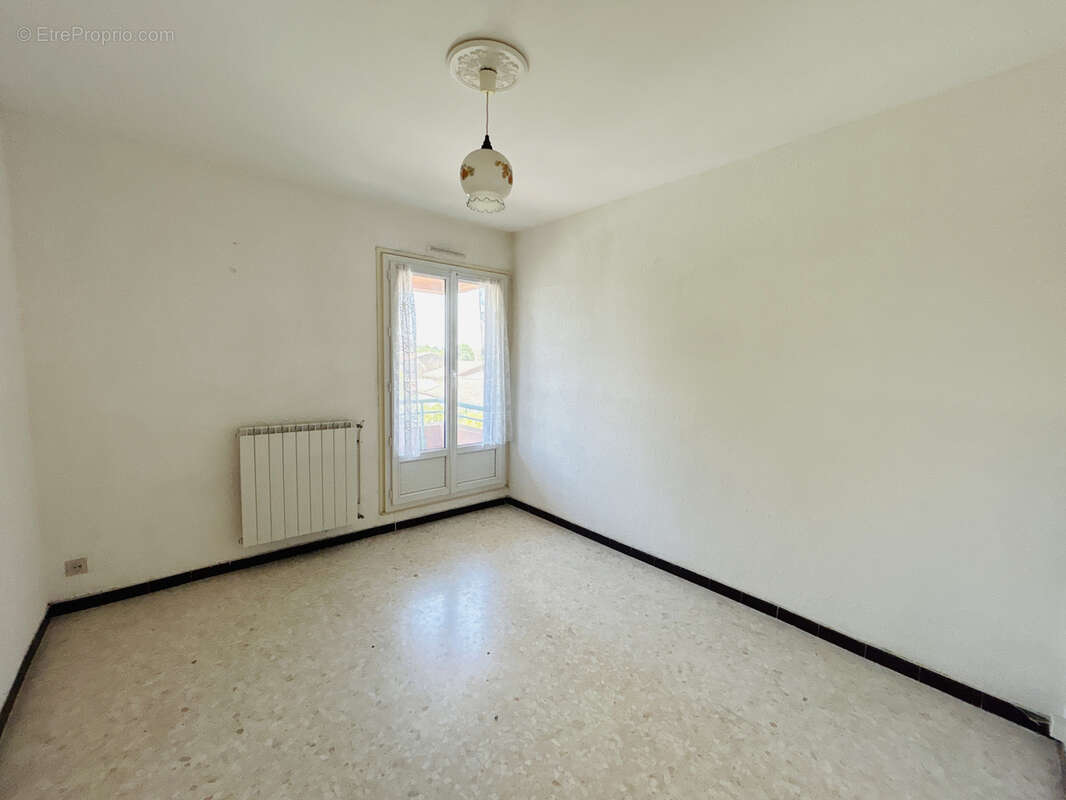 Appartement T4 avec 2 balcons + garage - photo 4