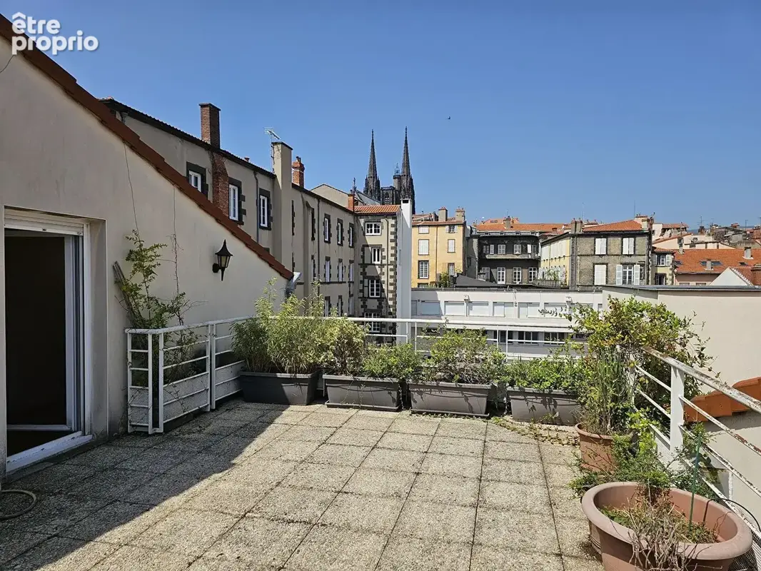Duplex - 3 terrasses - garage - plateau central - photo 2