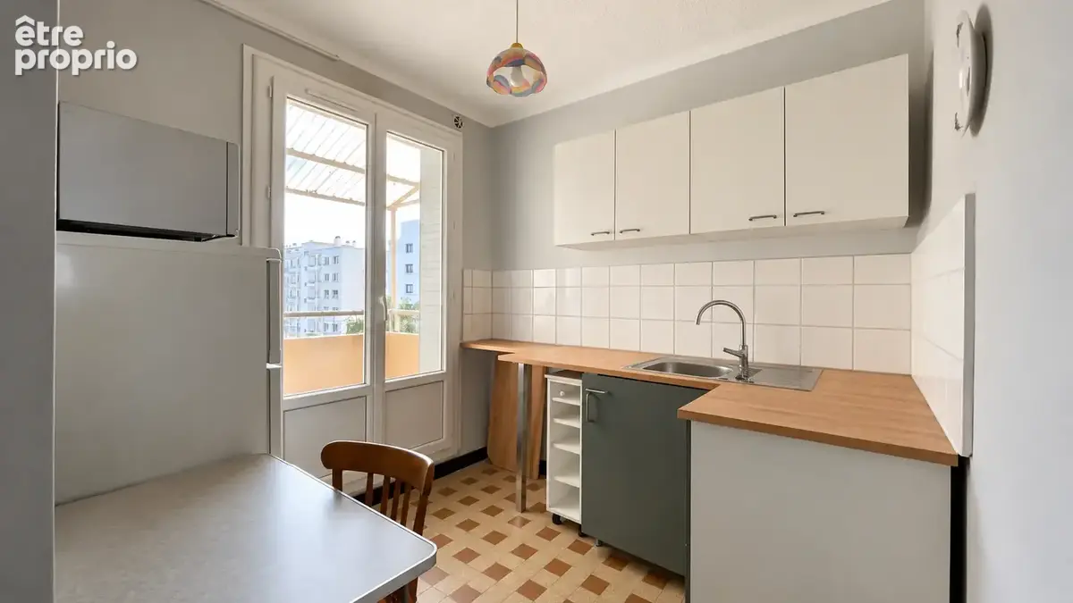 T3 traversant de 55 m2 / Étage élevé, balcon et cave / Lyon 7? - photo 4