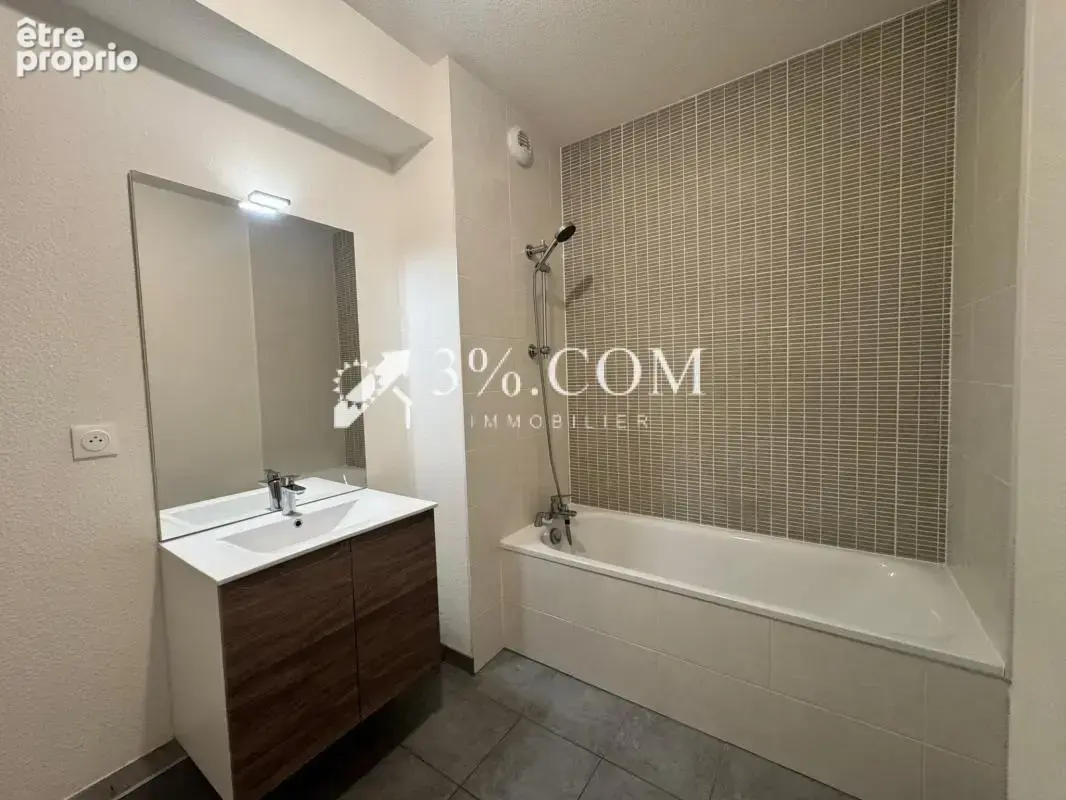 3%.COM - Bel appartement F3 avec terrasse et garage - photo 5