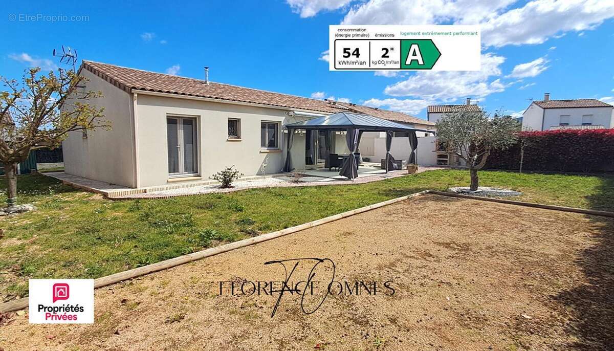 Maison  plain-pied  98m2 - 2 chambres  + bureau - jardin - Garage - aucun travaux - DPE A - photo 2