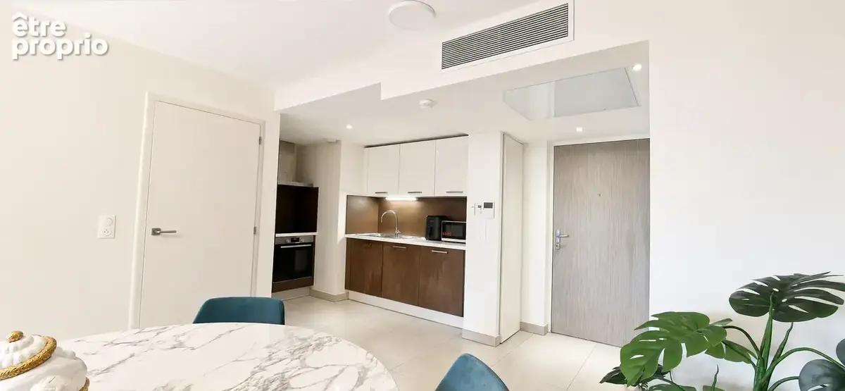 EXCLUSIVITE - Grand 2 pièces en rez de jardin + garage - photo 3