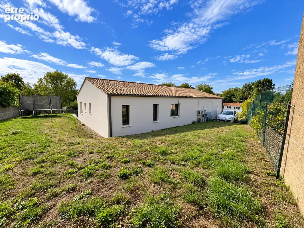 LANDERONDE   Maison de plain-pied avec véranda et suite parentale - photo 9