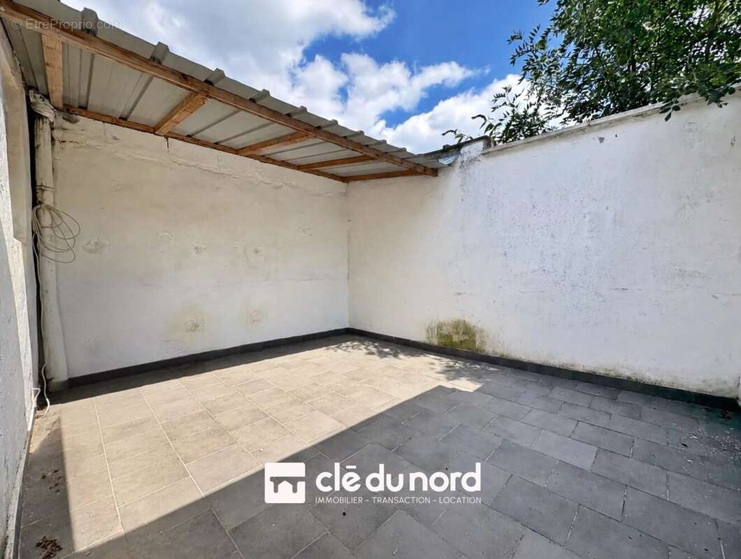 Maison 101 m² à Tourcoing  - photo 2