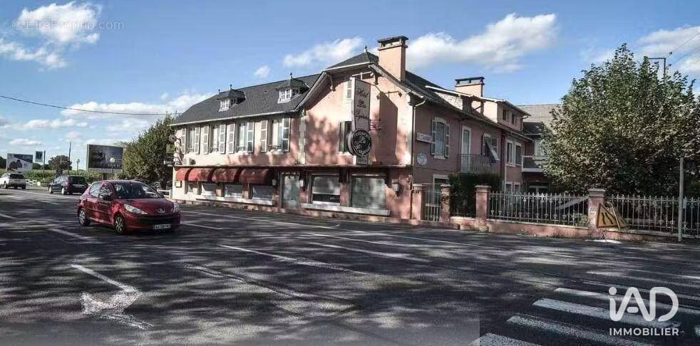 Photo 1 - Commerce à OUSSE