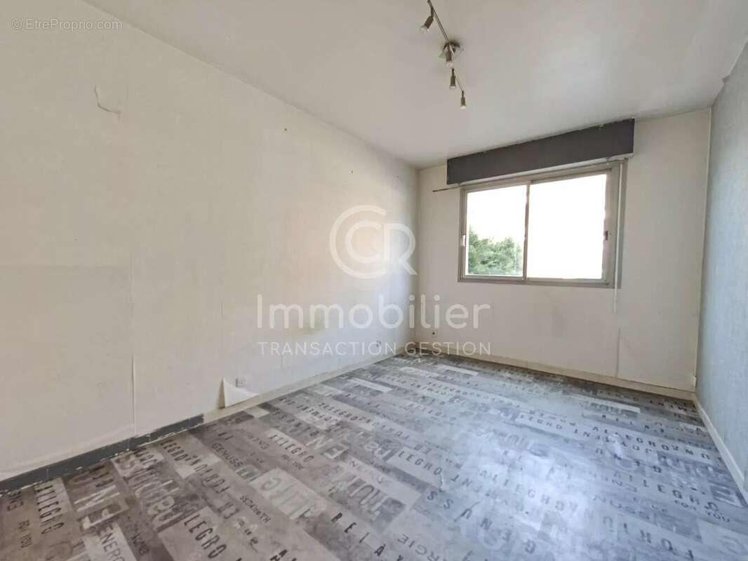 T3 traversant sud-nord 62m² rez-de-jardin - photo 8
