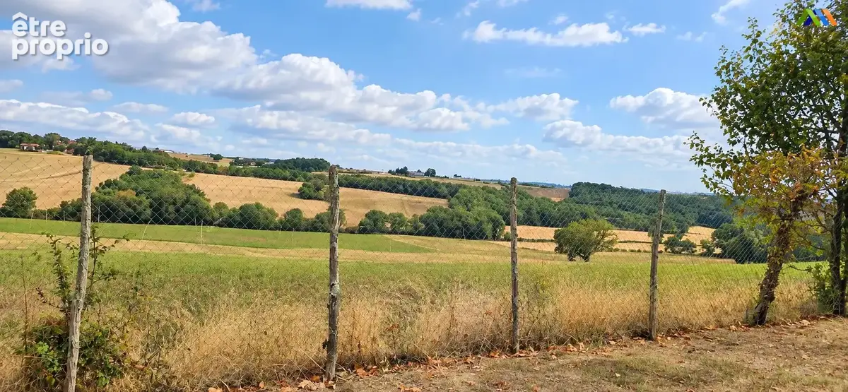 View across rolling fields, hedgerows and woodland from the garden of this property near Montesquiou.