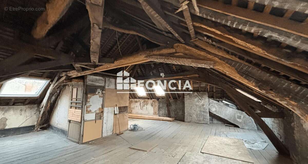 Appartement sur les quais avec garage possible et grenier à aménager - photo 5