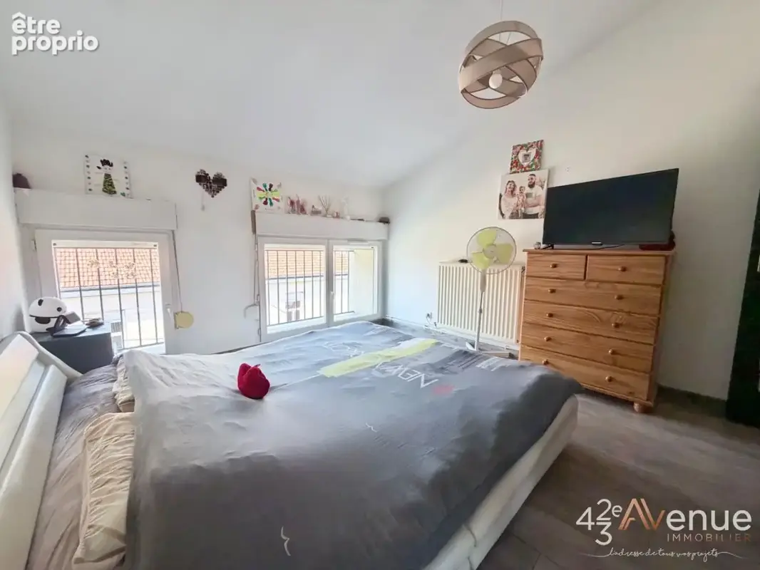 Appartement 4 pièces 90 m² à vendre à Saint-Etienne (42000) - photo 9