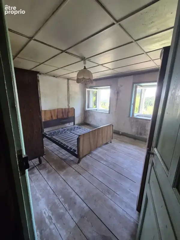 Maison en pierre sur deux niveaux avec dépendances et terrain à Connangles - photo 6