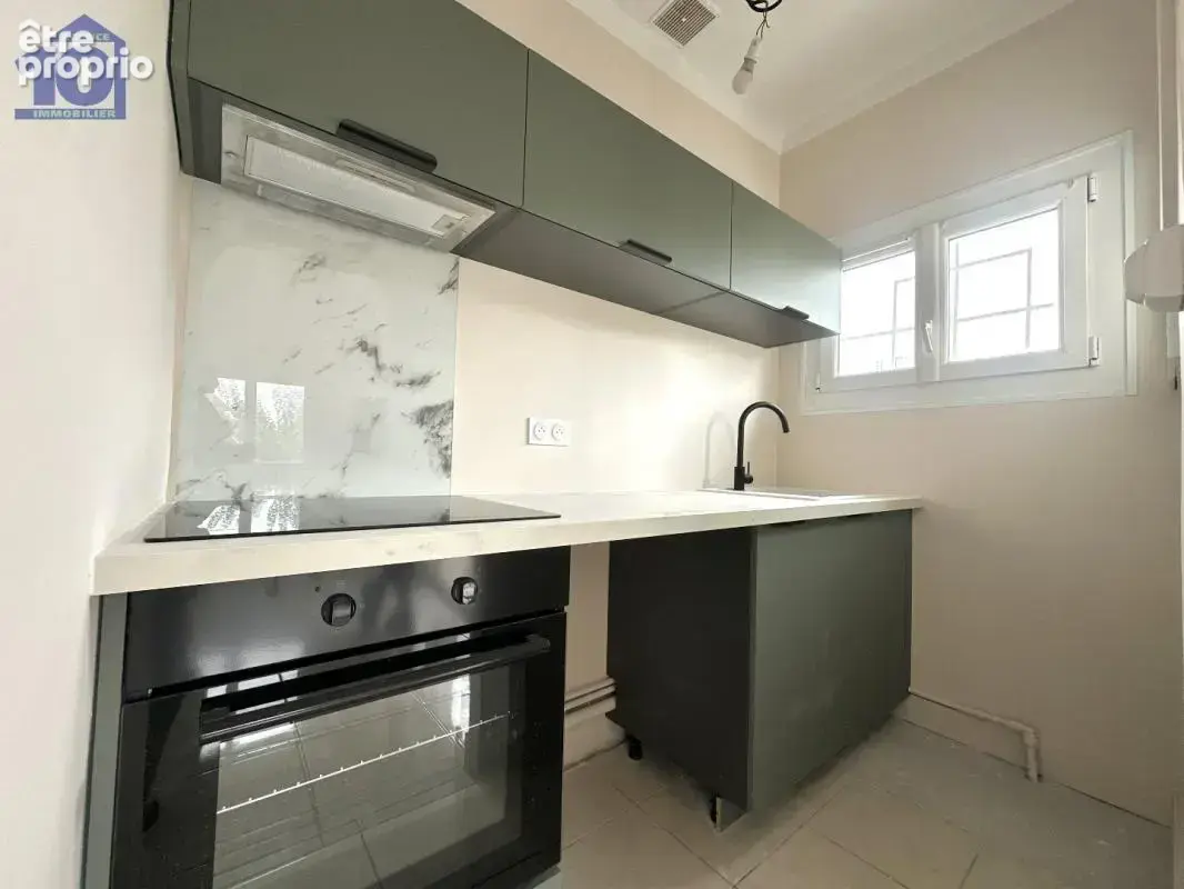 Appartement en rez-de-jardin - photo 3