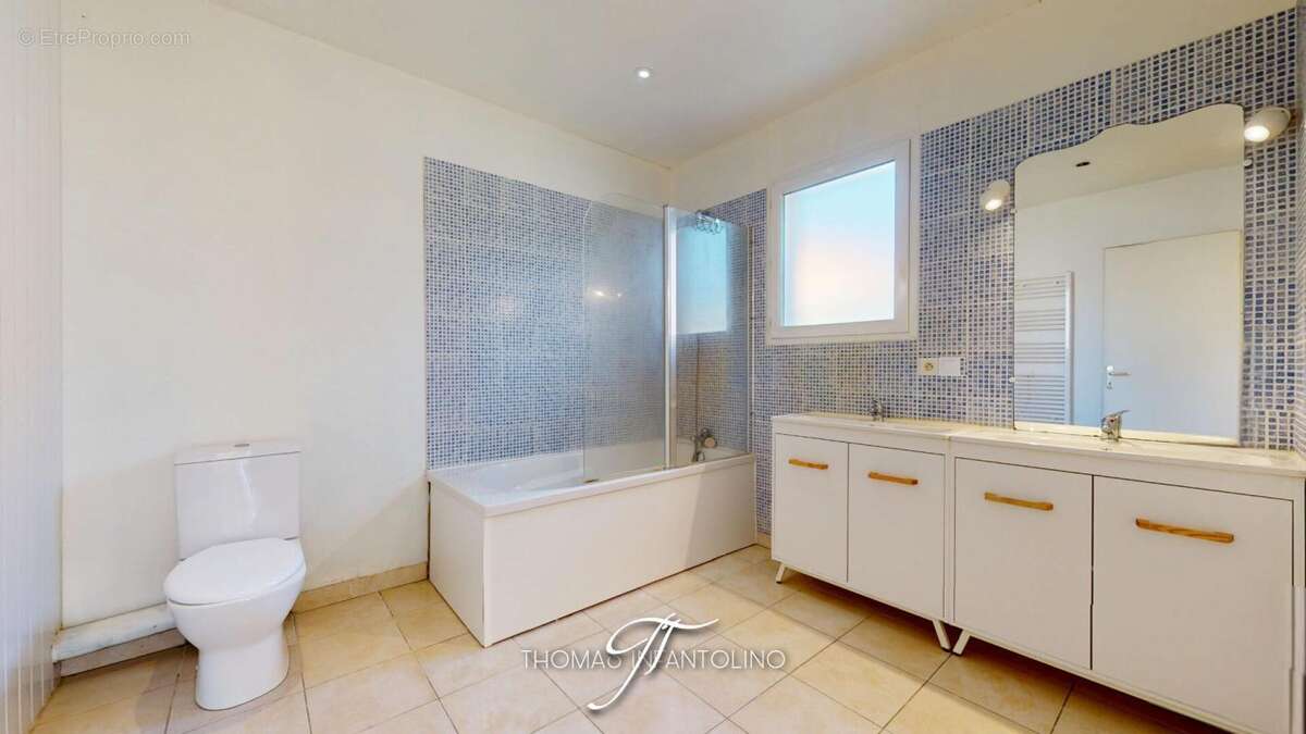 En exclusivite - maison 4 faces - 4 chambres - bureau - garage - photo 10