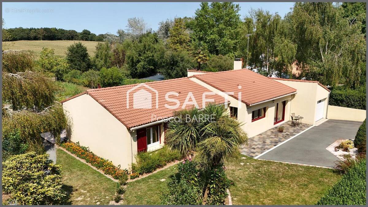 Photo 1 - Maison à SAINT-JULIEN-DES-LANDES