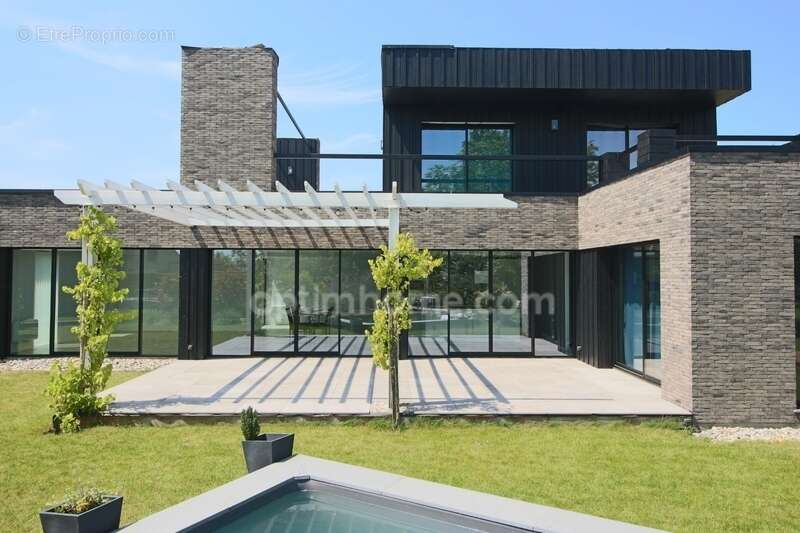 Templeuve-en-Pévèle – Maison cubique récente de 175 m² – Semi plain pied – Prestations haut de gamme - photo 3