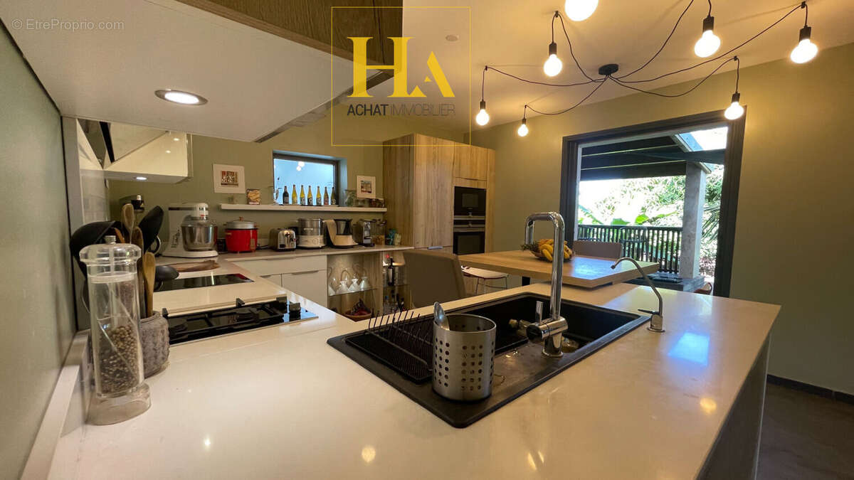 Maison Saint Louis - Parc Gol les Hauts 5 pièce(s) 145 m2 - photo 8