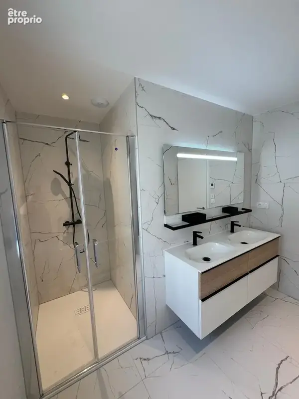 Appartement neuf au 1er étage avec balcon + 2 places de parking privatives. - photo 19