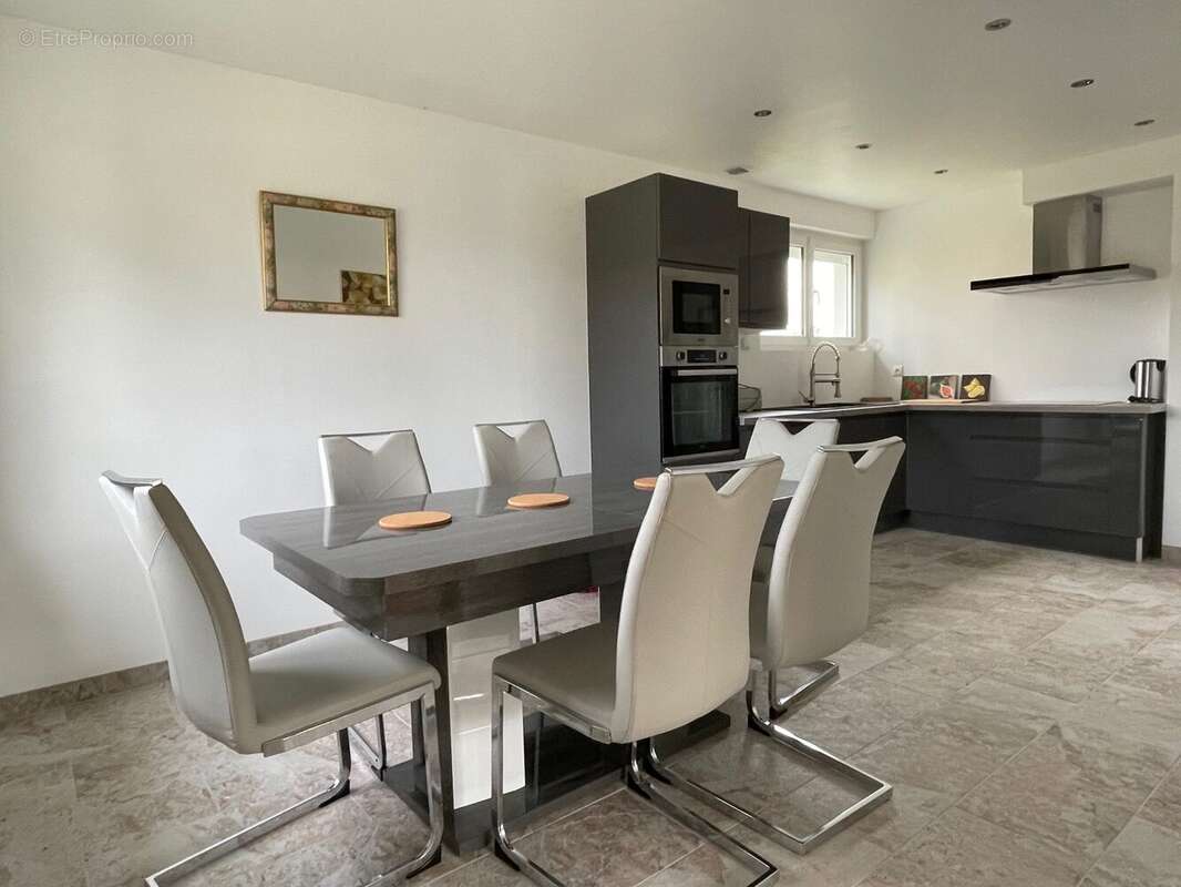 Maison 85 m² à Beaumont-Le-Roger  - photo 5