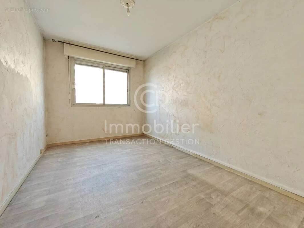 T3 traversant sud-nord 62m² rez-de-jardin - photo 9