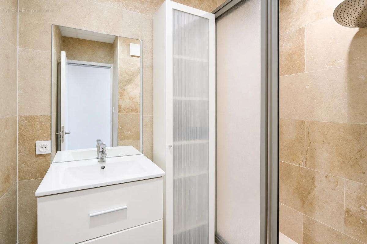 Appartement 4 pièces de 72 m² vendu loué - photo 13
