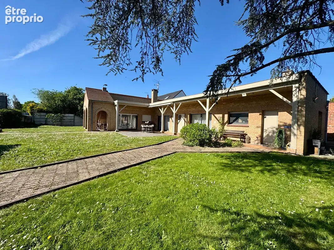 Superbe plain-pied de 149 m² avec jardin et stationnement ! - photo 2