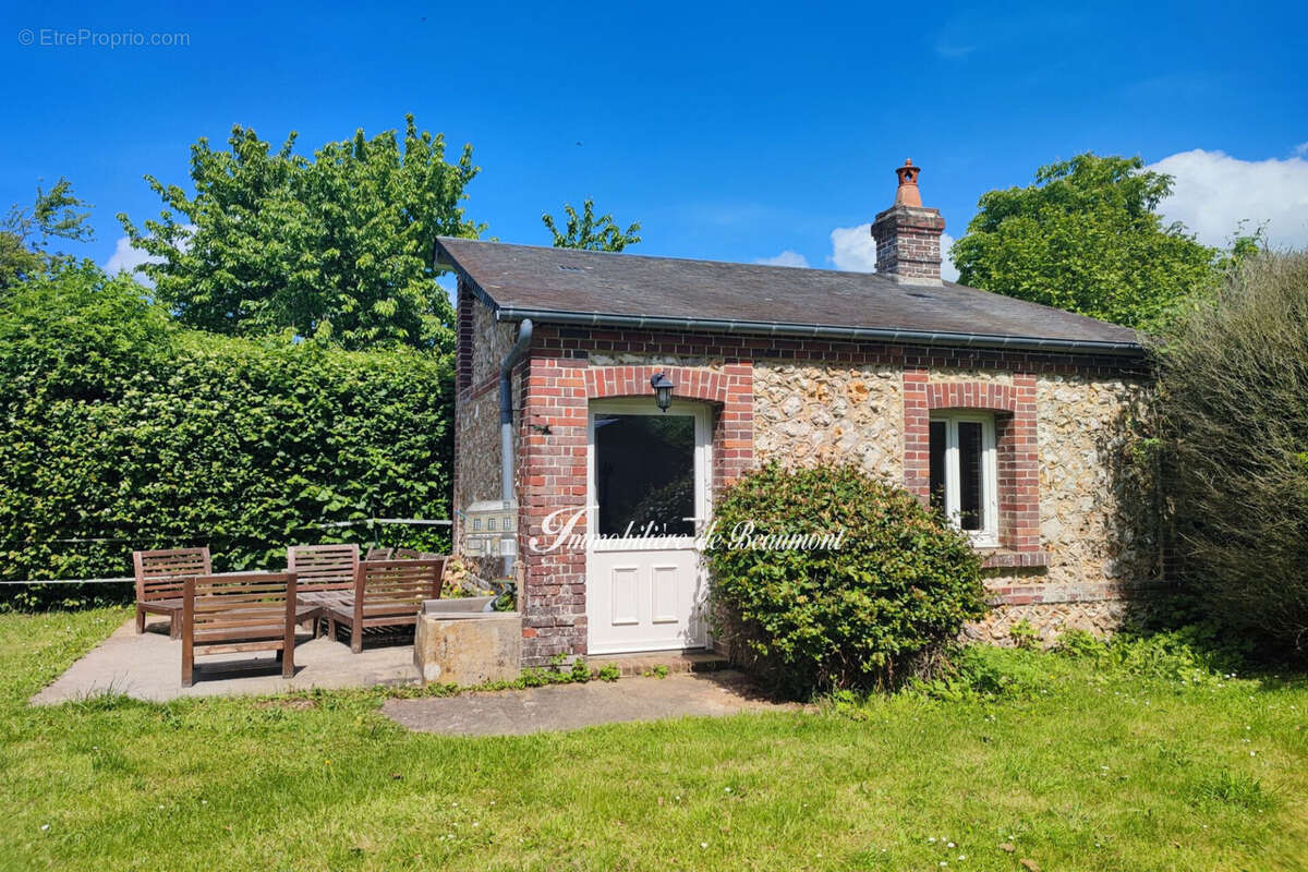 Maison 129 m² à Beaumont-Le-Roger  - photo 7
