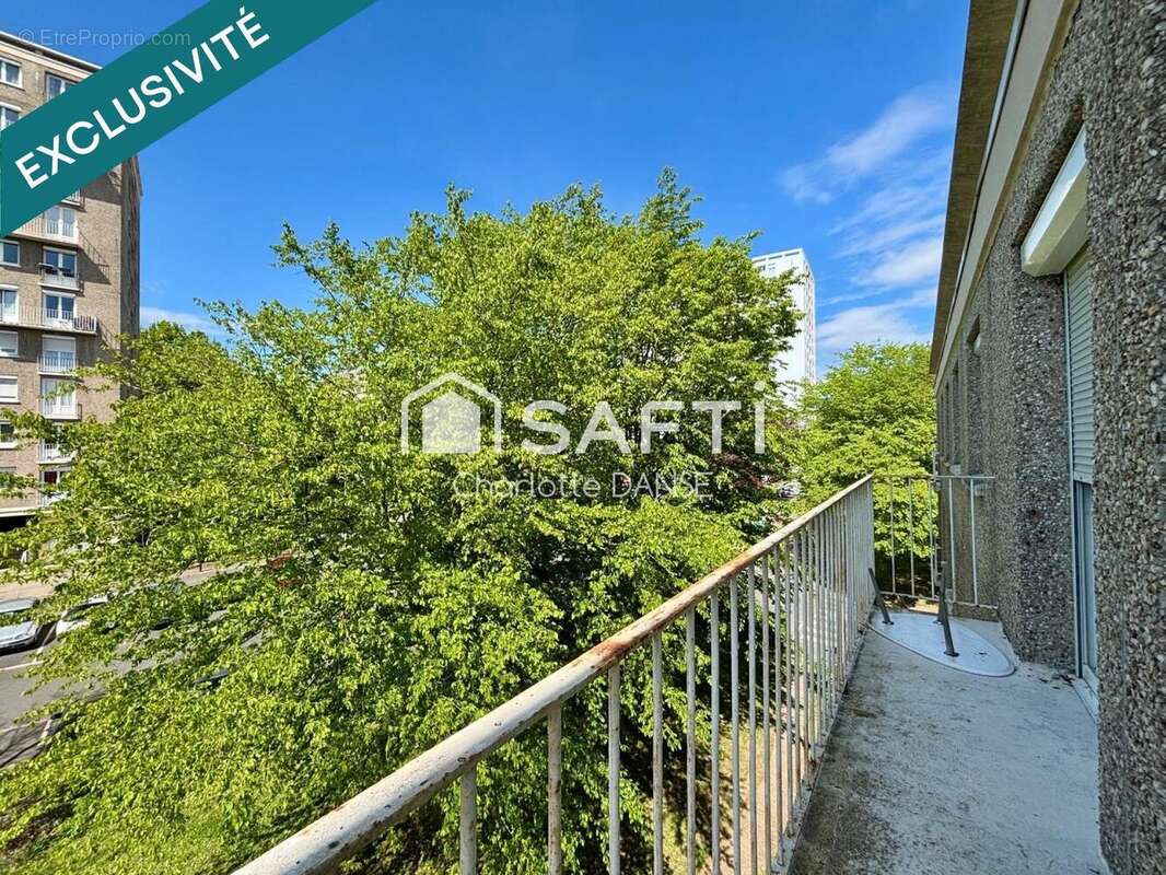 Photo 2 - Appartement à HEROUVILLE-SAINT-CLAIR