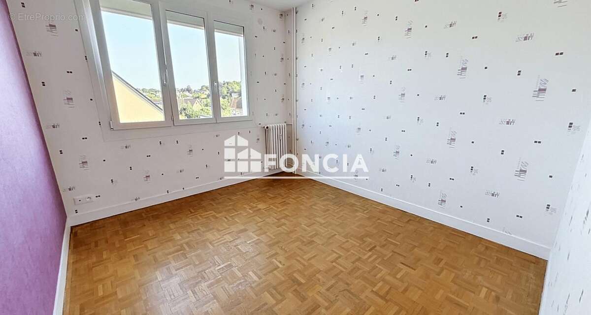 Appartement entièrement rénové avec balcon plein sud - photo 6