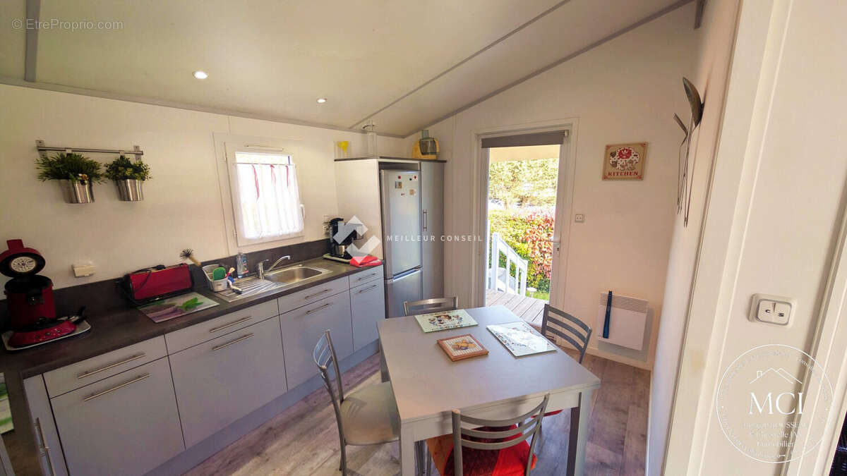Maison 56 m² à Caurel  - photo 4