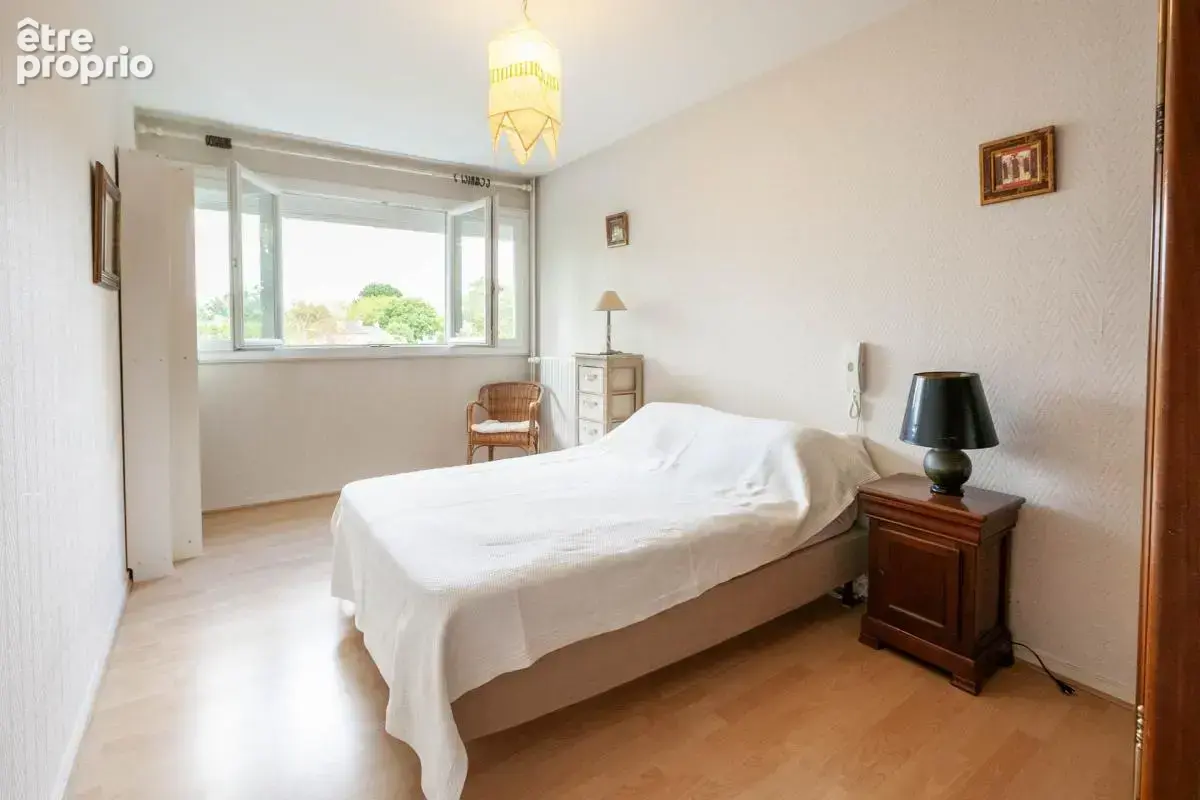 Appartement T3 72m² avec balcon plein sud - Box en sous-sol - photo 5