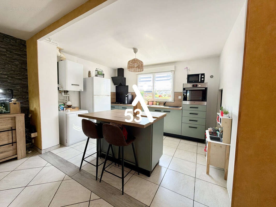 Maison 92 m² à Longuenesse  - photo 2