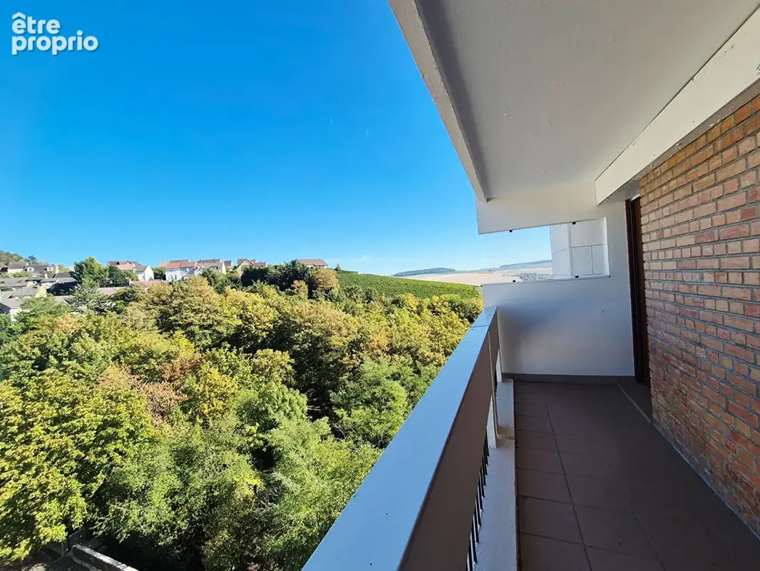 Appartement 3 pièces 69.90 m² au 7ème étage avec balcon et garage - photo 2