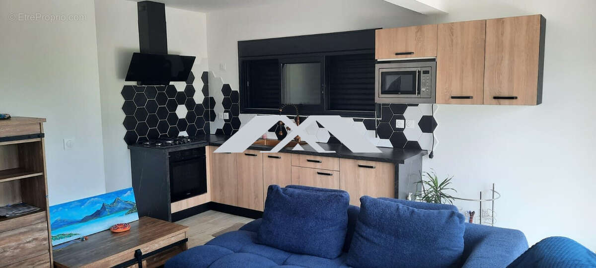 Maison 69 m² à Le Tampon  - photo 3