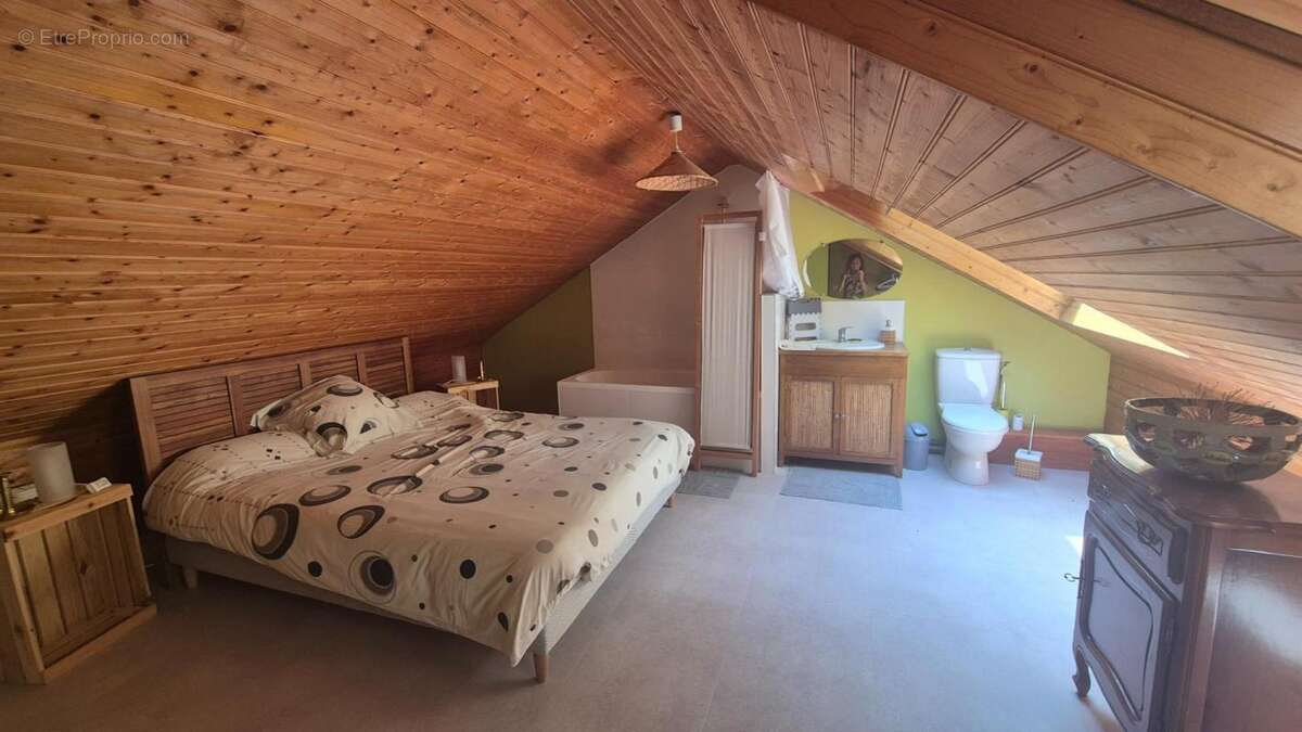 Maison sur terrain arboré à CHÂTEAU-THEBAUD - photo 11