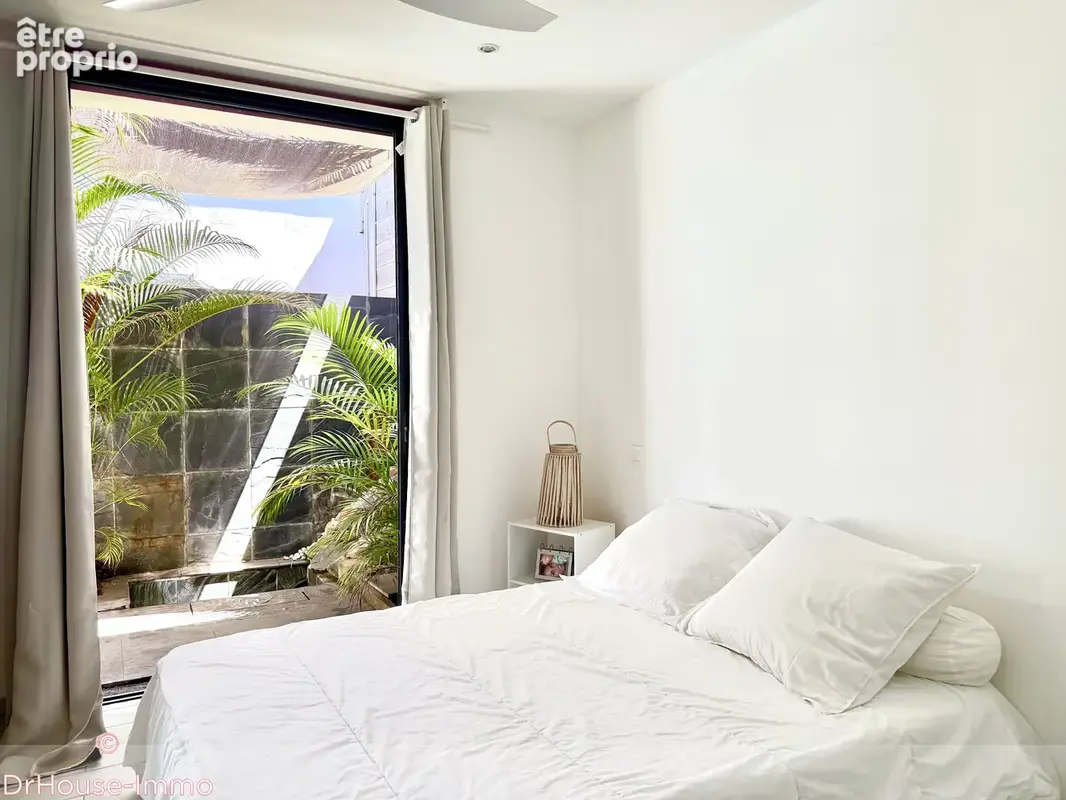 Maison 4 pièces 130 m² à vendre à Saint-Pierre (97410) - photo 5