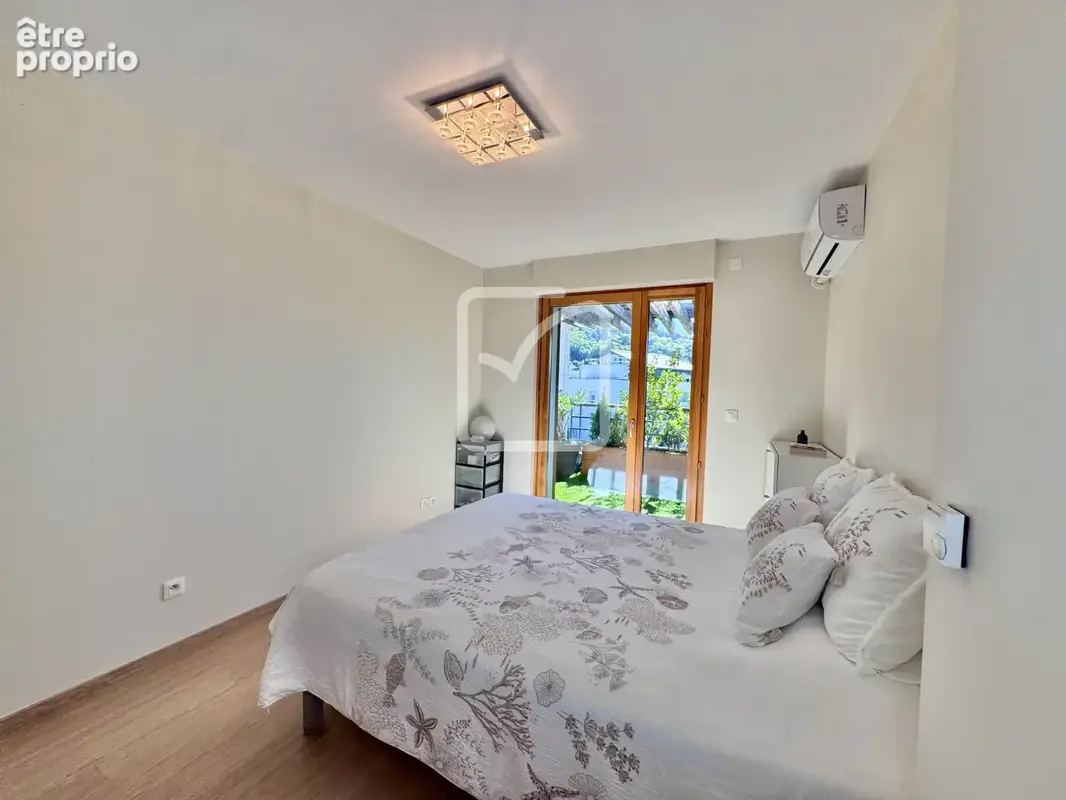 Appartement T4 de 90m2 pied dans l'eau - Amphion-Les-Bains - photo 11
