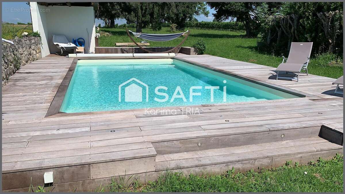 Photo 2 - Maison à TIZAC-DE-CURTON